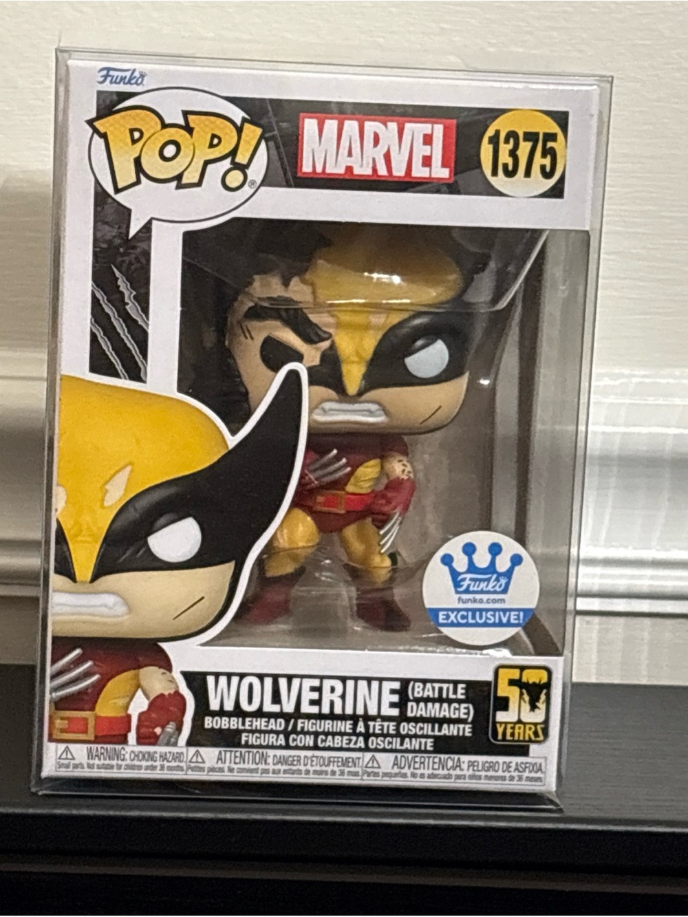 Funko Pop! Marvel Wolverine (Battle Damage) Funko Exclusive #1375 w/ Protector